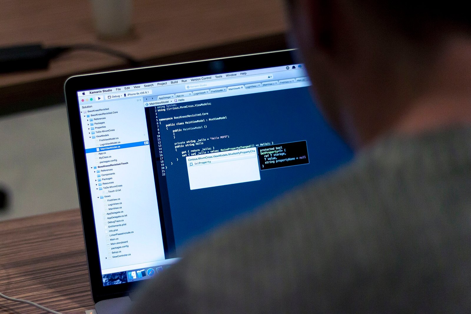 Laptop screen showing code in an IDE
